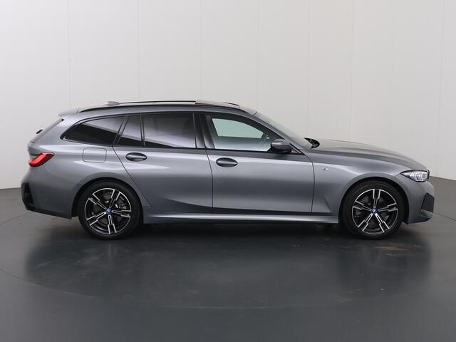 BMW 3 Serie e | SOH 97,8% | M-Pakket | BMW LED | Panormadak | Curved Display | HUD |  Elek. M-Sportstoelen met Geheugen | Parkeercamera | DAB | Cruise Control Adaptief | Elek. Achterklep | Apple Carplay/Android Auto |