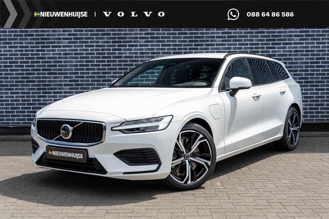 Volvo V60 n hybrid AWD Essential | Google | Longe Range | Stuurverwarming | Park Assist | Getint Glas | Stoelverwarming Voor + Achter | Zwarte Hemelbekleding | Camera | Lederen Bekleding | Zitverlenging | 19" LM