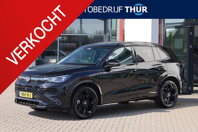 Volkswagen Tiguan e Business NL auto 1e eigenaar nieuw door ons geleverd  Lederen bekleding met elektrische stoelverstelling + geheugen + ventilatie + verwarming black style comfort plus 4 x stoelverwarming trekhaak multimedia pakket plus met o.a. harman e