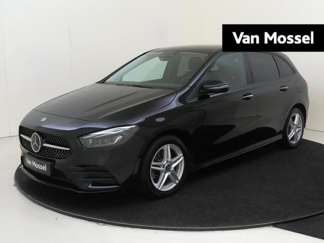 Mercedes-Benz B-Klasse Navigatie | Apple & Android Carplay | Climate Control | Wildscreen | Ambiance Verlichting | Stoelverwarming | Adaptive Cruise Control | Elek. Wegklapbare Trekhaak |