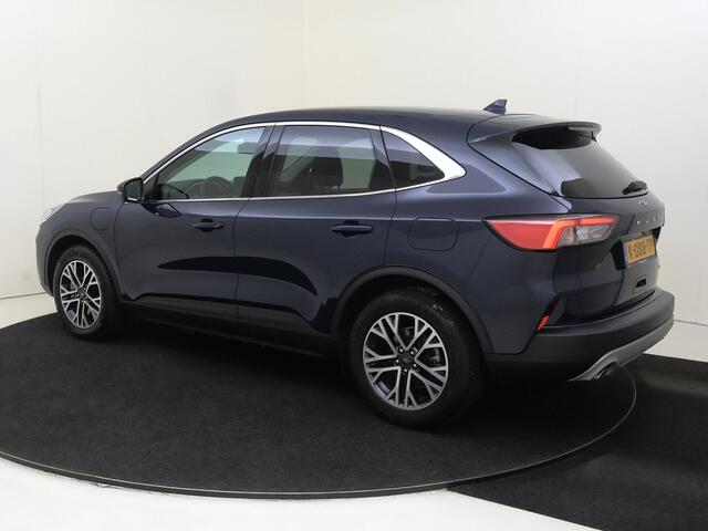 Ford Kuga Titanium | Climate Control / ECC | Licht metalen velgen 18 inch | Cruise control | Navigatie | Lederen bekleding zwart | Xenon koplampen | Park Distance Control voor en achter |