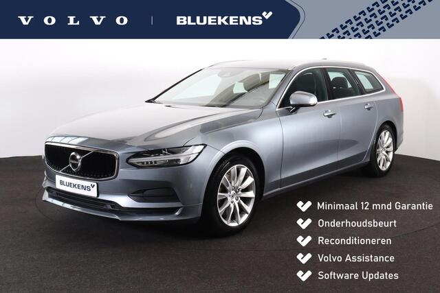 Volvo V90 um - IntelliSafe Assist & Surround - Navigatie - Apple® CarPlay - Android Auto - Lederen bekleding met verwarmbare voorstoelen - Elektr. bedienbare achterklep - Automatische bagageruimte afdekking - Parkeersensoren voor & achter - Automatisch dim