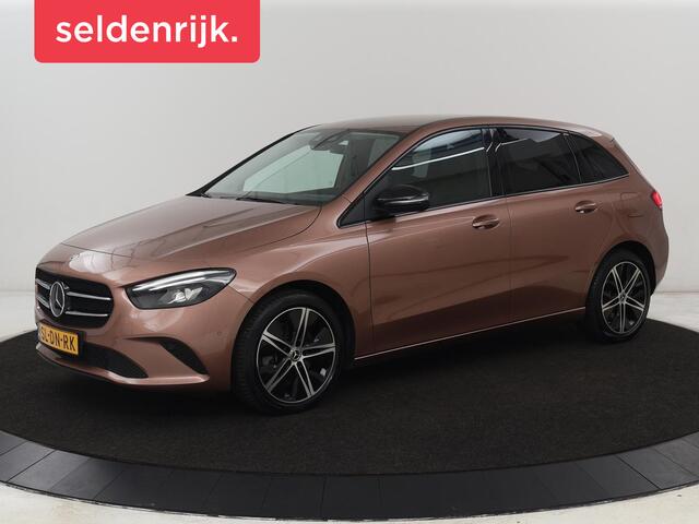 Mercedes-Benz B-Klasse 92% | Adaptive cruise | Stoelverwarming | Camera | Carplay | Sfeerverlichting | Half leder | Full LED | Widescreen | Park Assist | Navigatie | PHEV | Plug In
