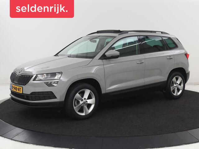 Skoda Karoq iness Edition | Panoramadak | Stoelverwarming | Carplay | Navigatie | Parkeerhulp | Climate control | Bluetooth | Cruise control | Getint glas