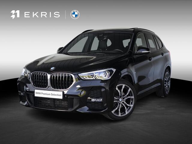 BMW X1 18i | M Sportpakket | Achteruitrijcamera | Panoramadak | Stoelverwarming | Head-Up Display | PDC | 19''
