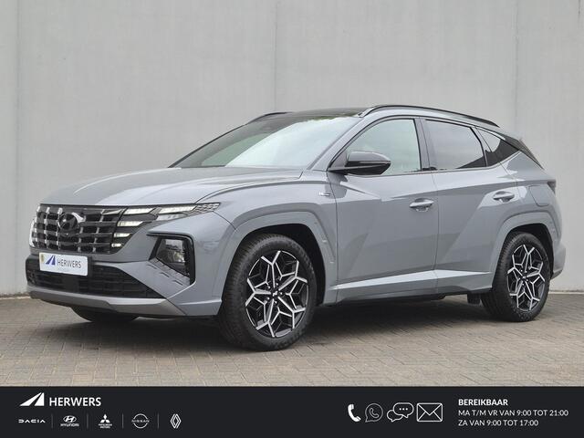 Hyundai Tucson Hybrid 4WD N Line Sky Automaat / Dealer onderhouden / Fabrieksgarantie tot 03-2027 / Trekhaak afneembaar / Panorama schuifdak / Trekgewicht 1650 kg / Navigatie / Apple Carplay Android / Elektrische achterklep / Stuur- Stoel & Achterbank ver