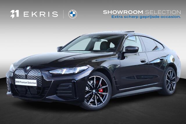 BMW i4 40 M Sport Edition 84 kWh M Sportpakket Pro/ Rubin-Metallic Individual Special Request Lakkleur/ Harman-Kardon/ Trekhaak/ Driving Assistant Professional