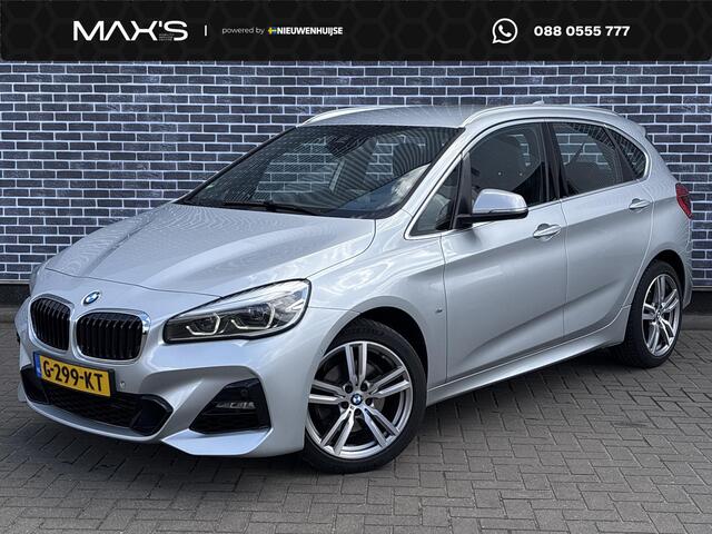 BMW 2 Serie er 220i High Executive | M-Sport | Head-up Display | Achteruitrijcamera | Elektrisch Verstelbare Voorstoelen | Trekhaak | Lederen Bekleding | Navigatie | Elektrische Achterklep | Lichtmetalen Velgen 18 inch | Stoelverwarming
