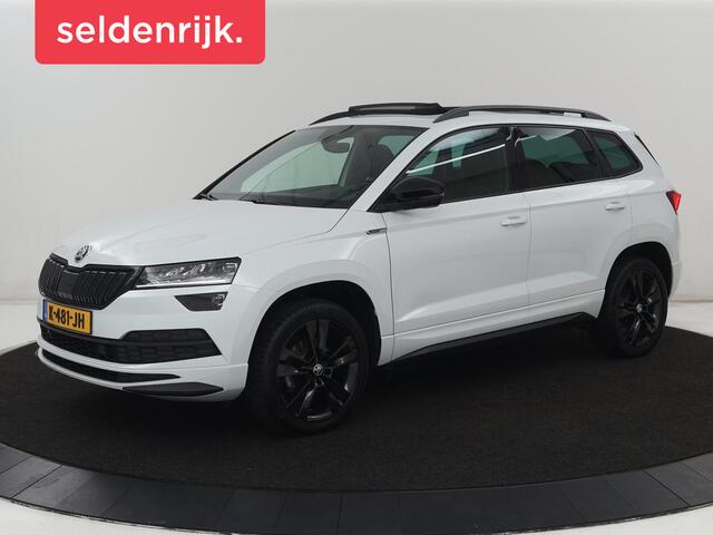 Skoda Karoq rtline | Panoramadak | Stoelverwarming | Adaptive cruise | Camera | Sportstoelen | Virtual Cockpit | Navigatie | Sfeerverlichting | Full LED | 18'' | Keyless | Climate control