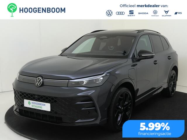 Volkswagen Tiguan e Edition | SoH 100% | Panoramadak | Harman/kardon | Black style | Adaptieve demping | 360 camera | Parkeerassistent | Stoelverwarming voor en achter |