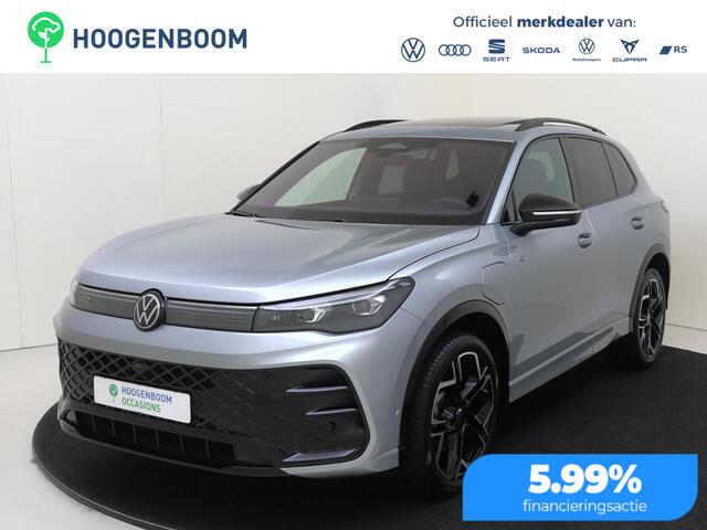 Volkswagen Tiguan e Edition | SoH 98% | Panoramadak | Trekhaak | Lederen bekleding 'Varenna' | Harman/kardon | Adaptieve demping | Head-up display | Black style |
