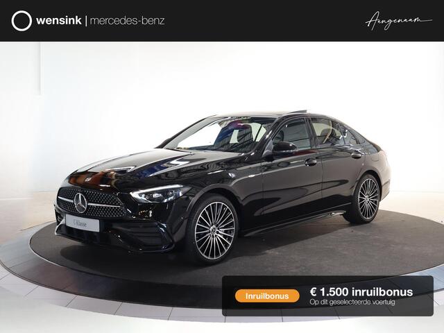 Mercedes-Benz C-Klasse AMG | Panoramaschuifdak | Nightpakket | Digital Light | 19" LM velgen | Dodehoekassistent | 360° camera | Stoelverwarming | Sfeerverlichting |