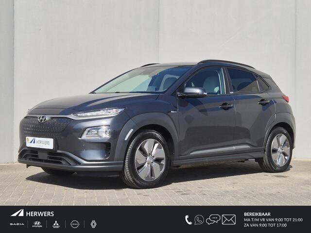 Hyundai Kona 4 kWh / SOH 100% / Dealer onderhouden / Head Up Display / CCS snelladen / Stuur- & Stoelverwarming / Warmtepomp / Achteruitrijcamera / Adaptief cruise control / Keyless Entry/Start / Apple Carplay Android Auto /