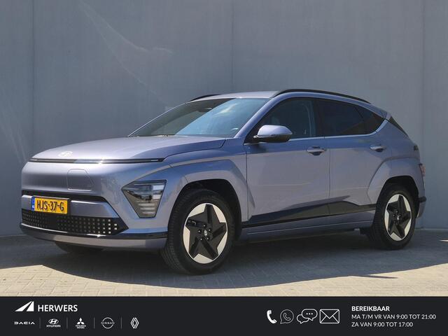 Hyundai Kona fort Smart 65.4 kWh / SOH 100% / Fabrieksgarantie tot 04-2030 / Stuur- & Stoelverwarming / CCS snelladen / Achteruitrijcamera / Head Up Display  / Adaptief cruise control / Keyless Entry/Start / Apple Carplay Android Auto /
