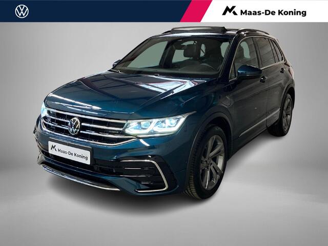 Volkswagen Tiguan kW/245PK R-Line DSG · Panoramadak · Trekhaak · 360°Camera + Parkeersensoren · Garantie t/m 19-06-2026 of 60000km.