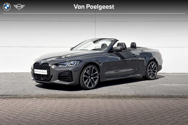 BMW 4 Serie i xDrive High Executive | Trekhaak | Driving Assistant Professional | Harman/Kardon | Nekverwarmer
